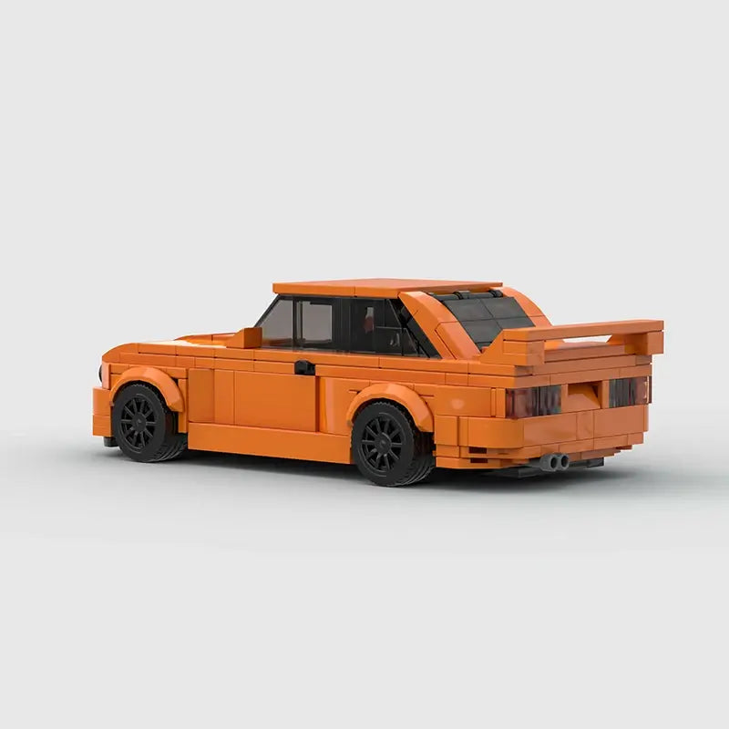 BMW M3 E30|Orange brick model - side profile view - TheBrickTube