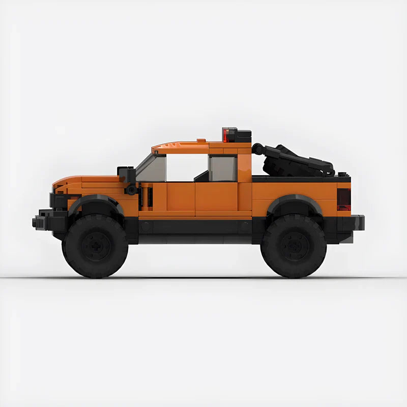 Ford F150 Raptor|Orange brick model - rear angle view - TheBrickTube